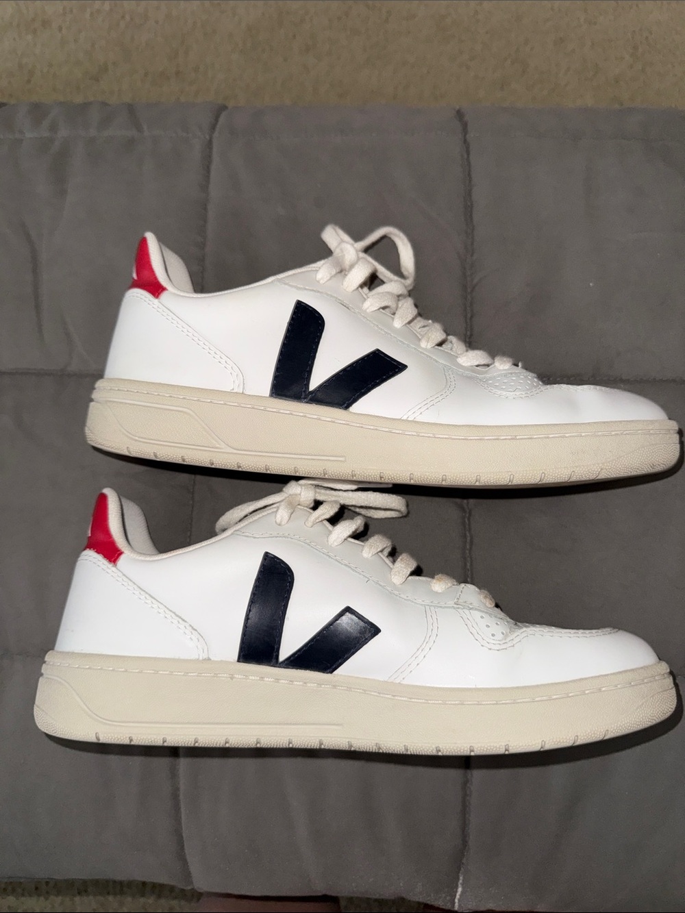 Veja Women’s V10 White Leather Sneakers with Black V and Red Heel Accent